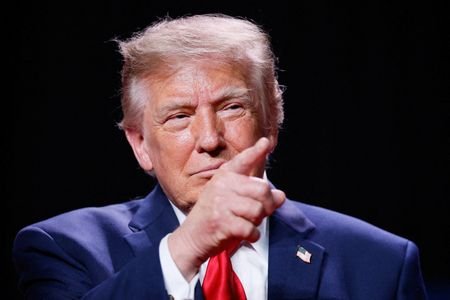 US President Donald Trump attends a campaign rally for Republican