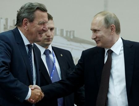 FILE PHOTO: Russian President Putin meets with heads of foreign