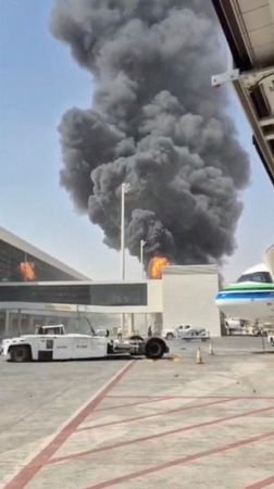 Smoke and flames rise from King Khalid Airport, after Yemen’s