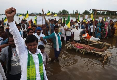 As rising waters flood homes and temples, villagers protest India’s $87 billion river-linking project
