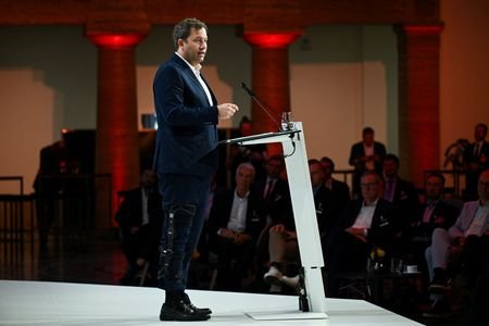 German Chancellor Merz and Finance Minister Klingbeil attend a meeting