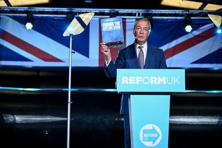 Britain's Reform UK leader Nigel Farage holds a press conference