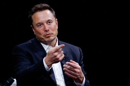 FILE PHOTO: Tesla CEO and X owner Elon Musk attends