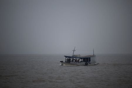 Smoke from fires in the Amazon Rainforest blankets the city