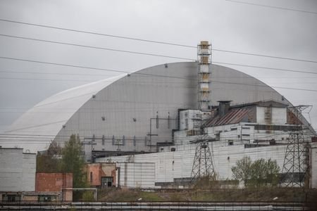 The New Safe Confinement (NSC) structure covers the old sarcophagus,