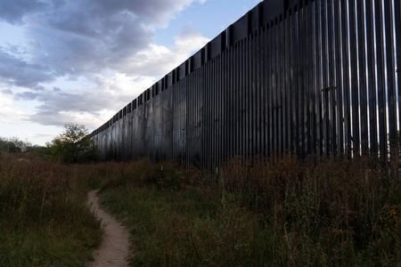 US-Mexico border fence construction continues despite protests in Lochiel, Arizona
