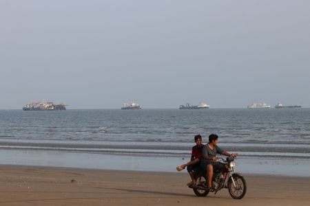 Vessels in the Strait of Hormuz near the beach of