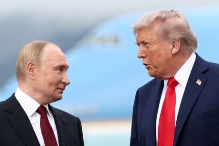 FILE PHOTO: US President Trump meets with Russian President Putin