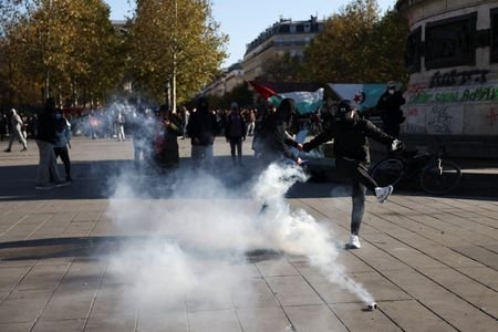 Demonstrators gather at the Place de la Republique, in Paris