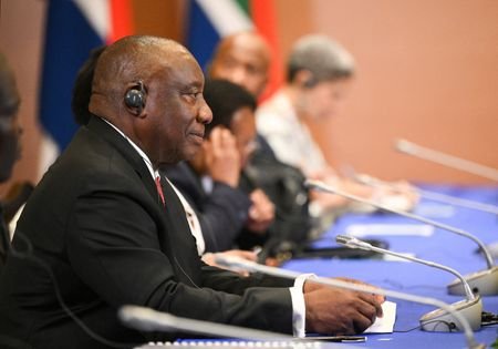 Russia's President Putin and South Africa's President Ramaphosa meet in