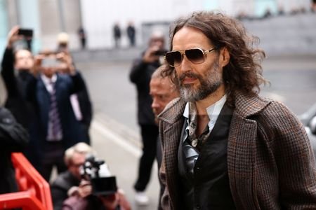 Comedian Russell Brand anally raped me, woman tells UK trial