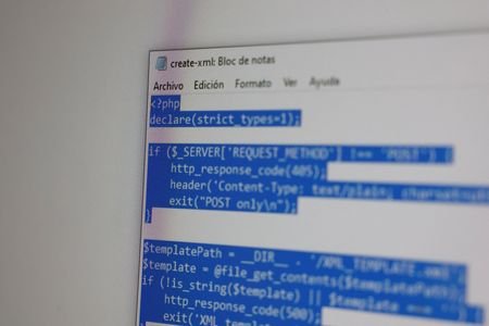 PHP code is displayed on a computer in Guernica