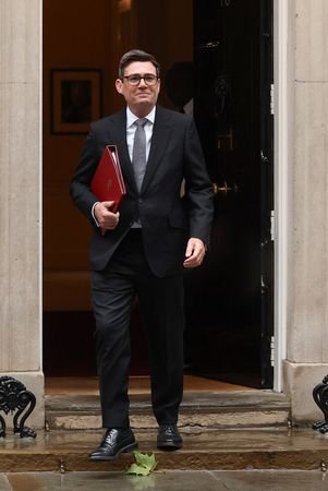 Britain's PM Burnham leaves 10 Downing Street to attend PMQs,