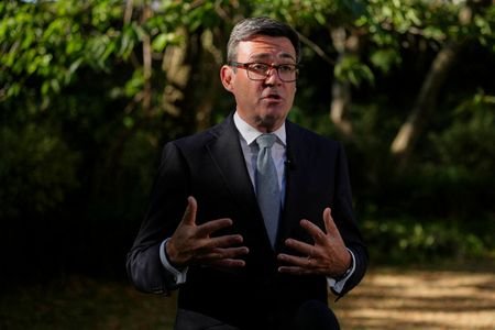 FILE PHOTO: Britain's Prime Minister Andy Burnham speaks to the