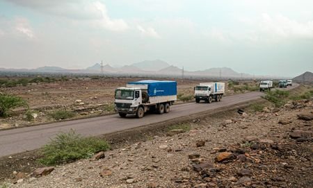 WFP trucks carry aid to Darfur and other famine-stricken parts