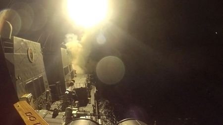 USS Michael Murphy (DDG 112) launches Tomahawk cruise missiles from
