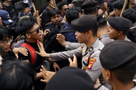 University students take part in a protest against President Prabowo