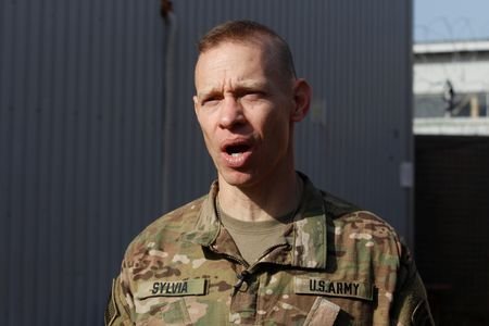 U.S. Army Colonel Brett G. Sylvia speaks during an interview