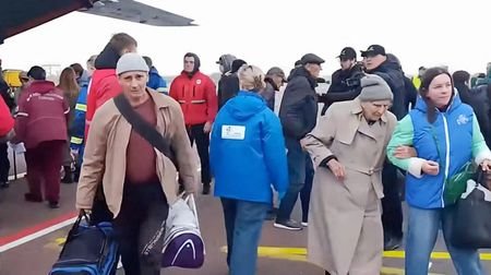 Planes carrying residents evacuated from the Russian-controlled Ukrainian town of